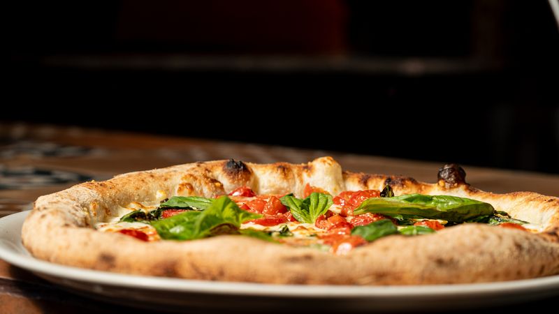 Punch pizza classic prosciutto pizza with arugula